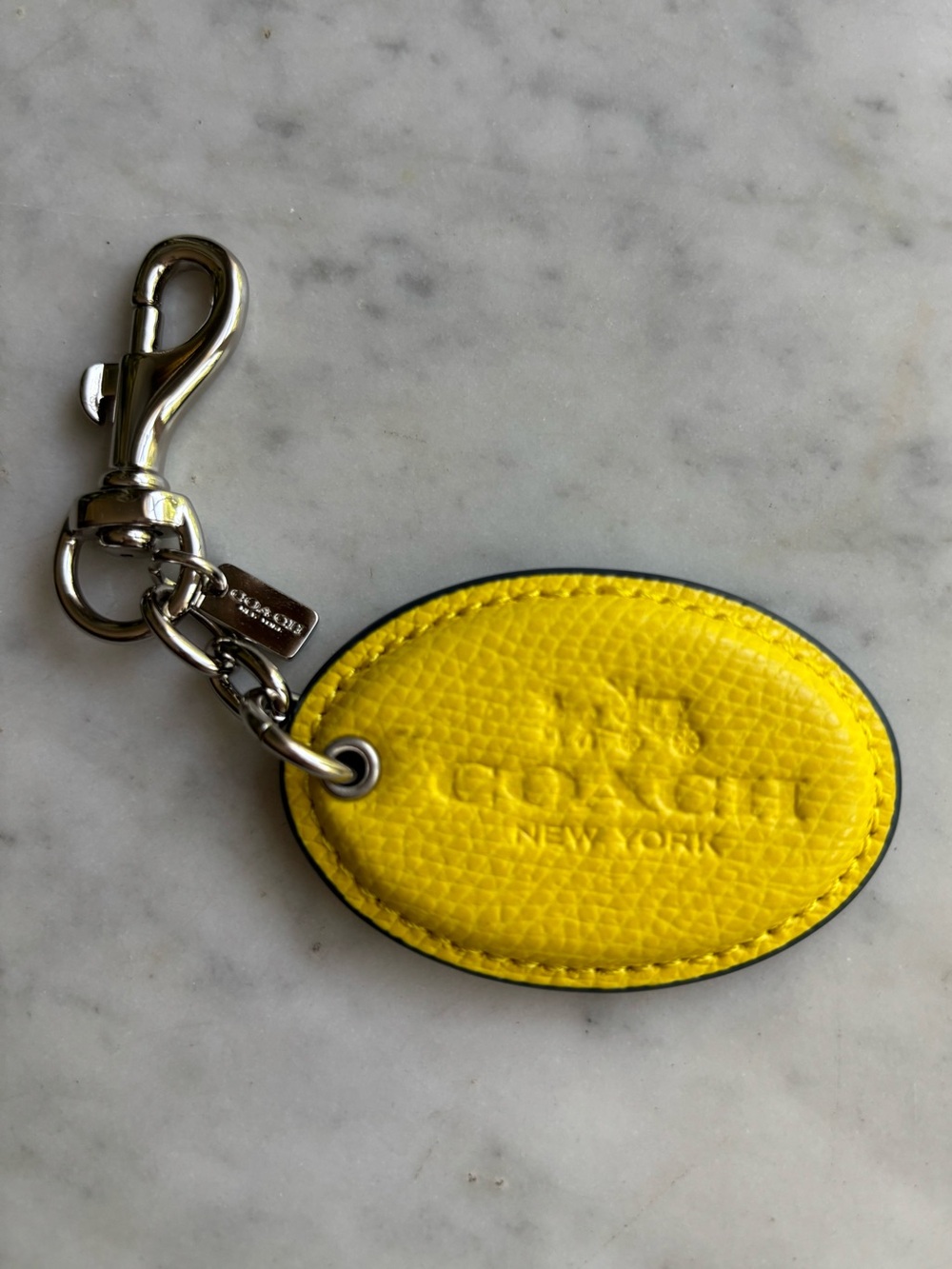 NWOT Coach Yellow Pebbled Leather Oval Bag Charm with Silver Hardware